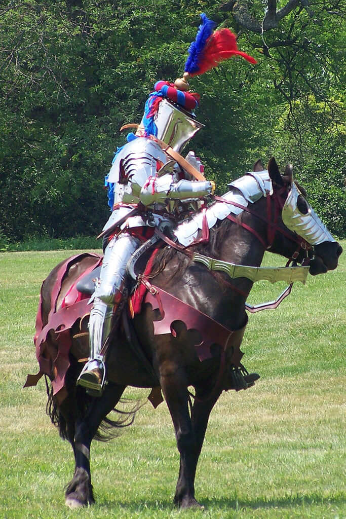 Fifteenth century knight in jousting helm with crest
https://www.flickr.com/photos/8765199@N07/5852054581